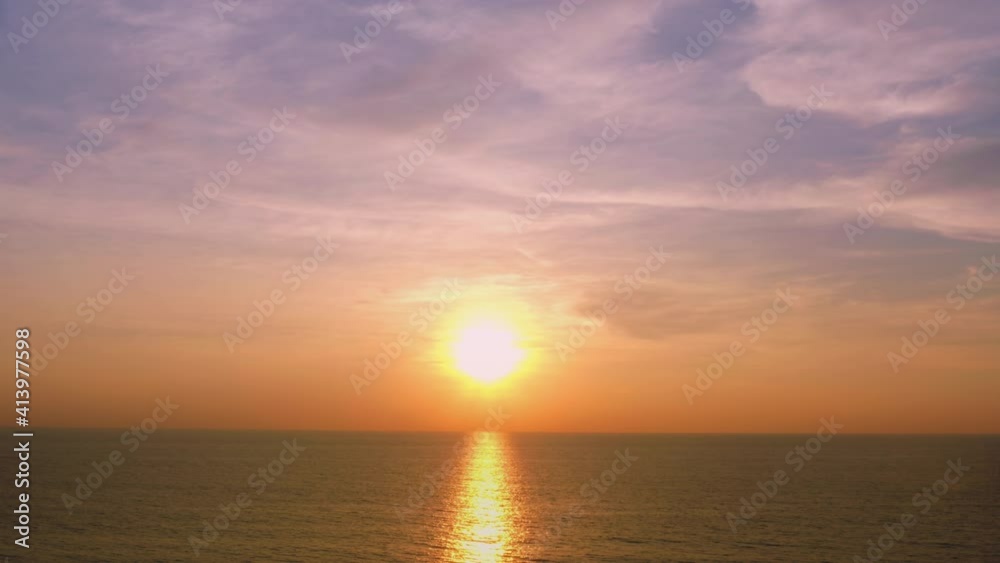 4K Beautiful tropical beach with sunset sky. Beautiful Phuket beach is famous tourist destination at Andaman sea summer concept. Areal drone view tropical beach with sunset over the sea 4K Beautiful tropical beach with sunset sky. Beautiful Phuket beach is famous tourist destination at Andaman sea summer concept. Areal drone view tropical beach with sunset over the sea