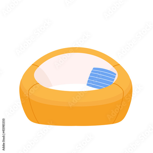 Stylish yellow round comfortable flat karton style armchair with blue cushion. Part of the interior of a living room