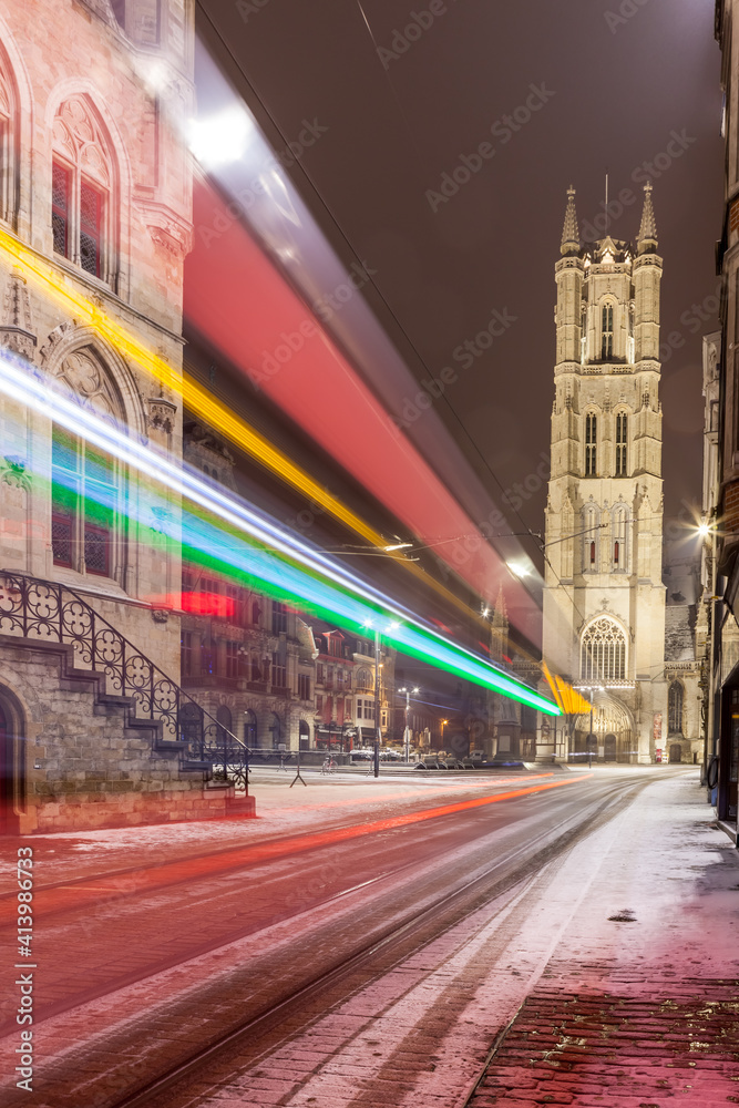 Naklejka premium Saint Bavo Cathedral of Ghent during snowfall