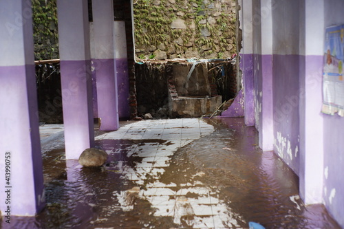 flash floods that destroyed dozens of houses and caused casualties. buildings destroyed after being hit by floods, storms, landslides in the rainy season. a disaster caused by overflowing river water