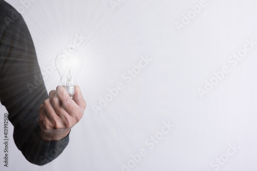 light bulb in hand	
