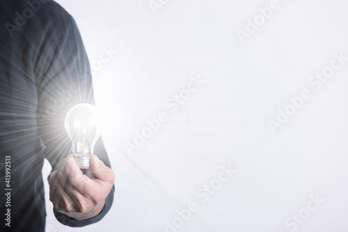 light bulb in hand	
