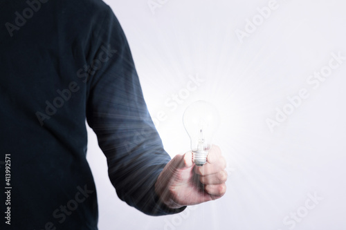 light bulb in hand	
