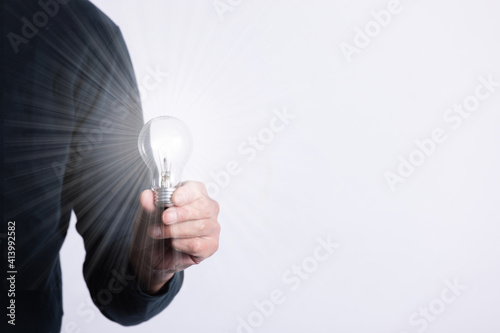 light bulb in hand	
