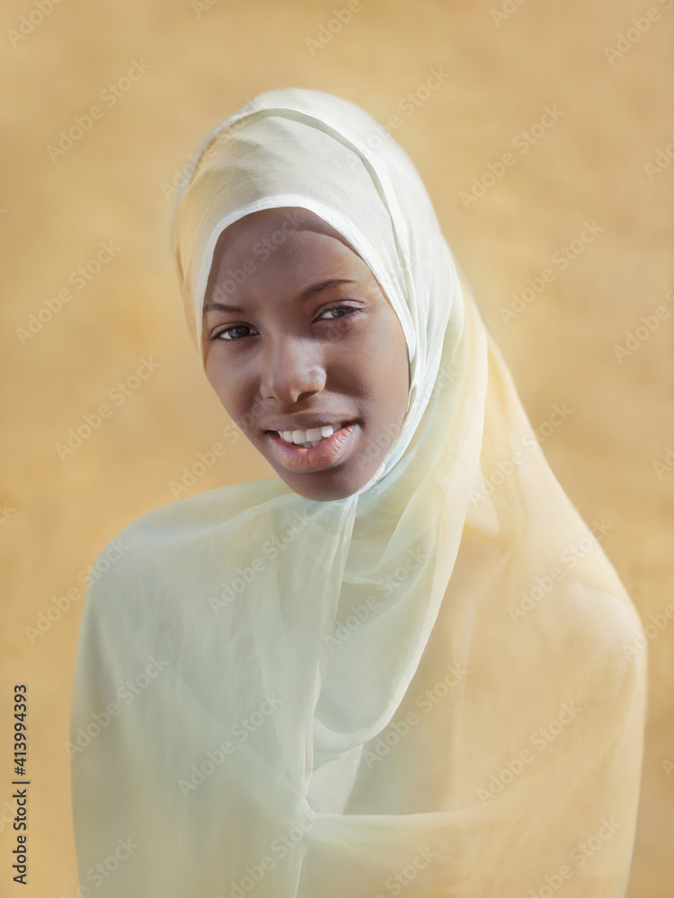 Beautiful girl wearing a headscarf and smiling, photo Beautiful girl wearing a headscarf and smiling, photo