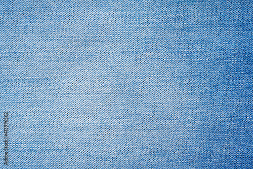 Denim blue jeans fabric. Denim background texture for design. Canvas denim. Blue jeans texture for any background.