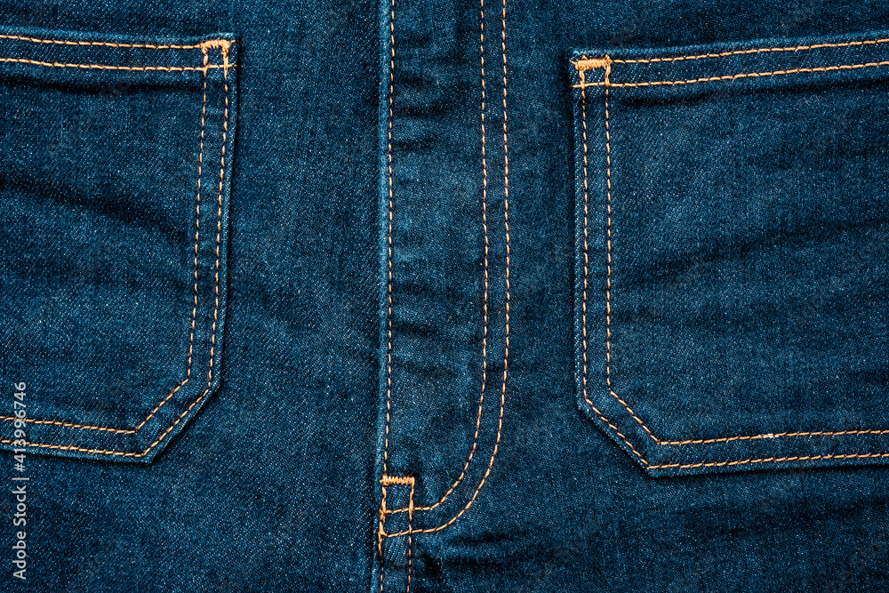 Blue jeans denim front pockets. Close up photo. Blue jeans denim front pockets. Close up photo.