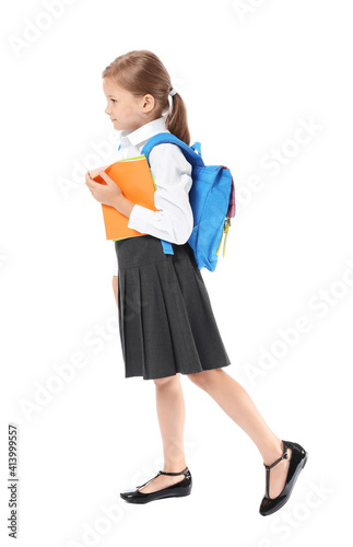 Little schoolgirl on white ...