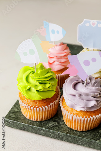 Tasty cupcakes with stylish...