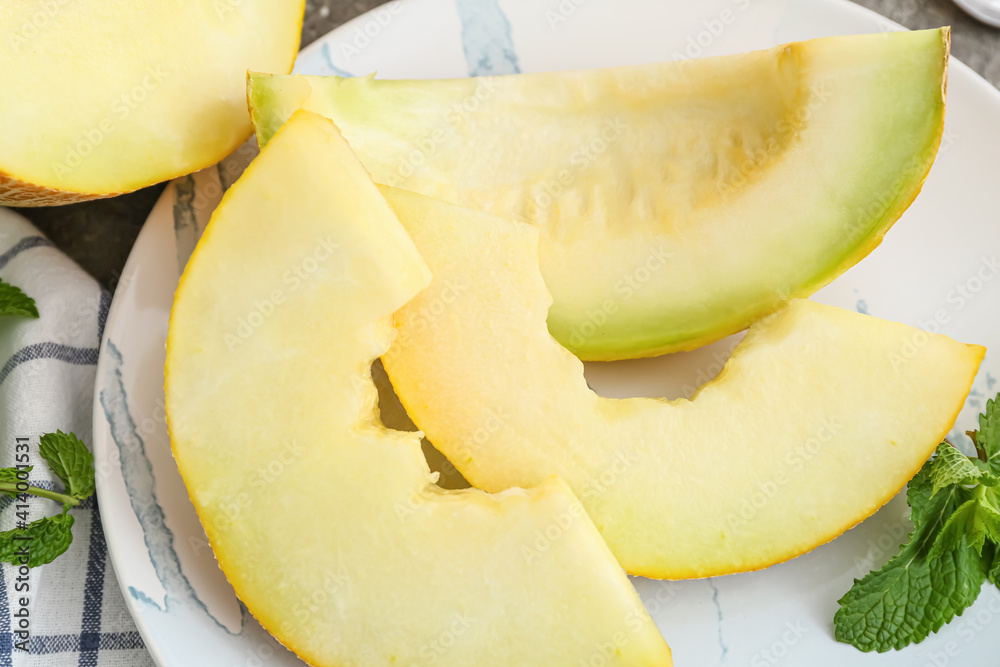 Plate with sweet cut melon, closeup