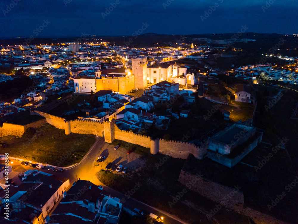 Obraz premium Night aerial view of medieval castle of Estremoz in Portuguese civil parish of Santa Maria de Devassa