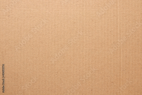 Brown cardboard sheet abstract background, texture of recycle paper box in old vintage pattern for design art work.