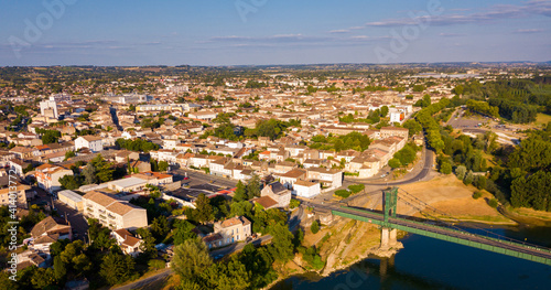 Cuadro en lienzo View from drone of small French town of Marmande with suspension bridge over Gar