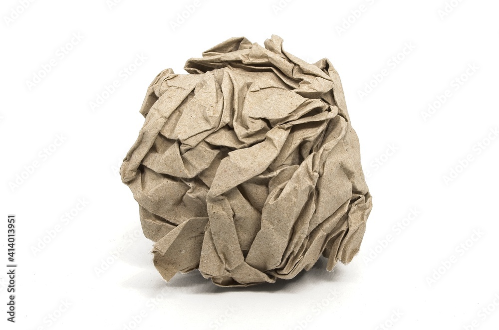 Crumpled piece of recycled paper on white background. Green waste