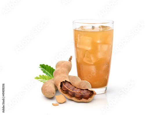 Tamarind ice juice with tamarind fruits isolated on white background.