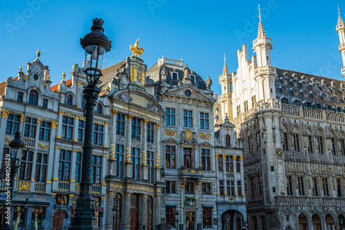 Architecture and facade of some building in Grand Place, Brussels during the winter season on a beautiful sunny day