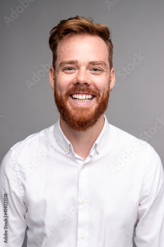 Cheerful modern man with ginger beard © kegfire