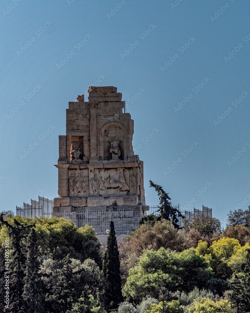 Athens Greece, the Philopappos ancient monument on the hill in front of Acropolis Athens Greece, the Philopappos ancient monument on the hill in front of Acropolis