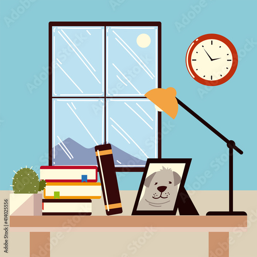 work at home office desk books lamp picture and cactus