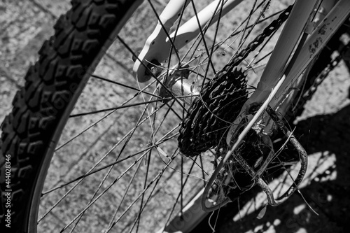 bicycle wheel rusty with cobwebs