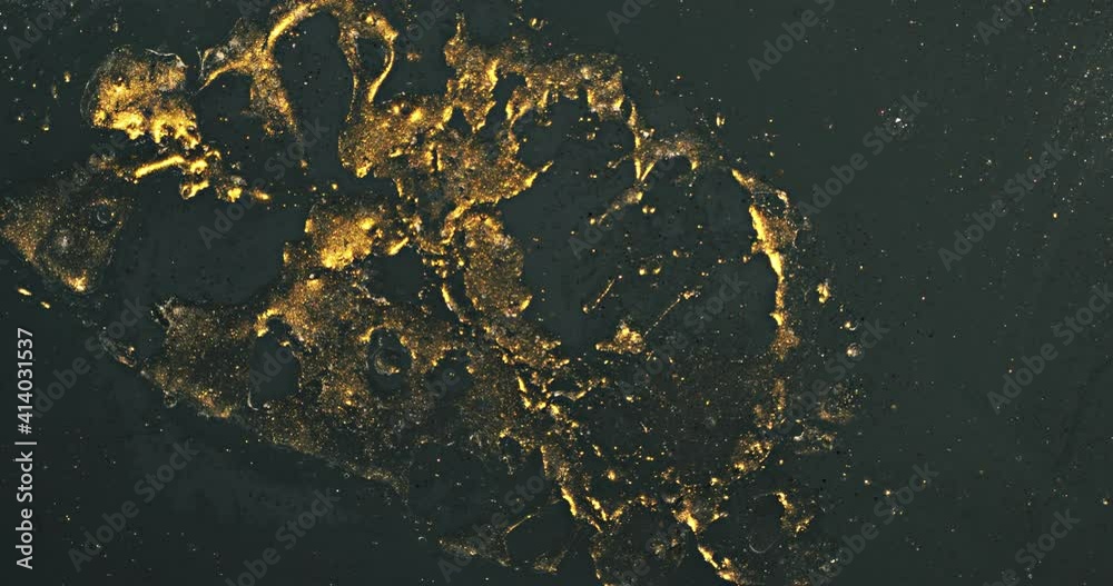 Gold and Black. Macro Movement of fluids. Slow Motion. Fluids Art. Gold and Black. Macro Movement of fluids. Slow Motion. Fluids Art.
