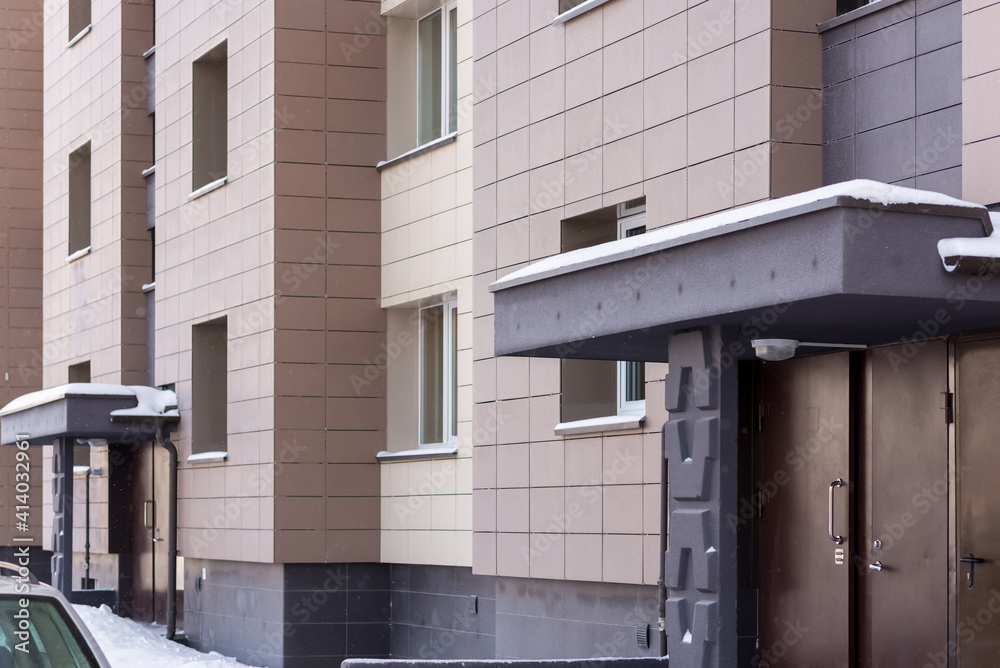 Fototapeta premium Fragment residential apartment with flat building exterior. Detail of New luxury house and home complex.