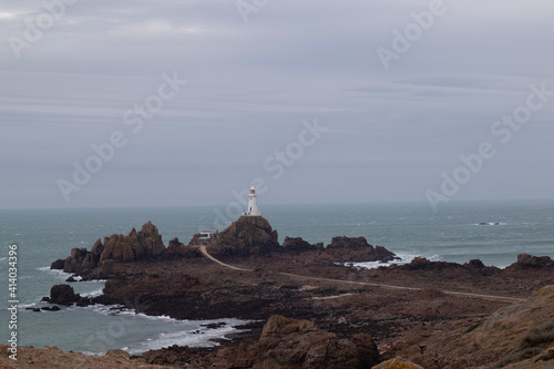 lighthouse on the coast, Corbiere Lighthouse, Jersey, Channel Islands, Winter day