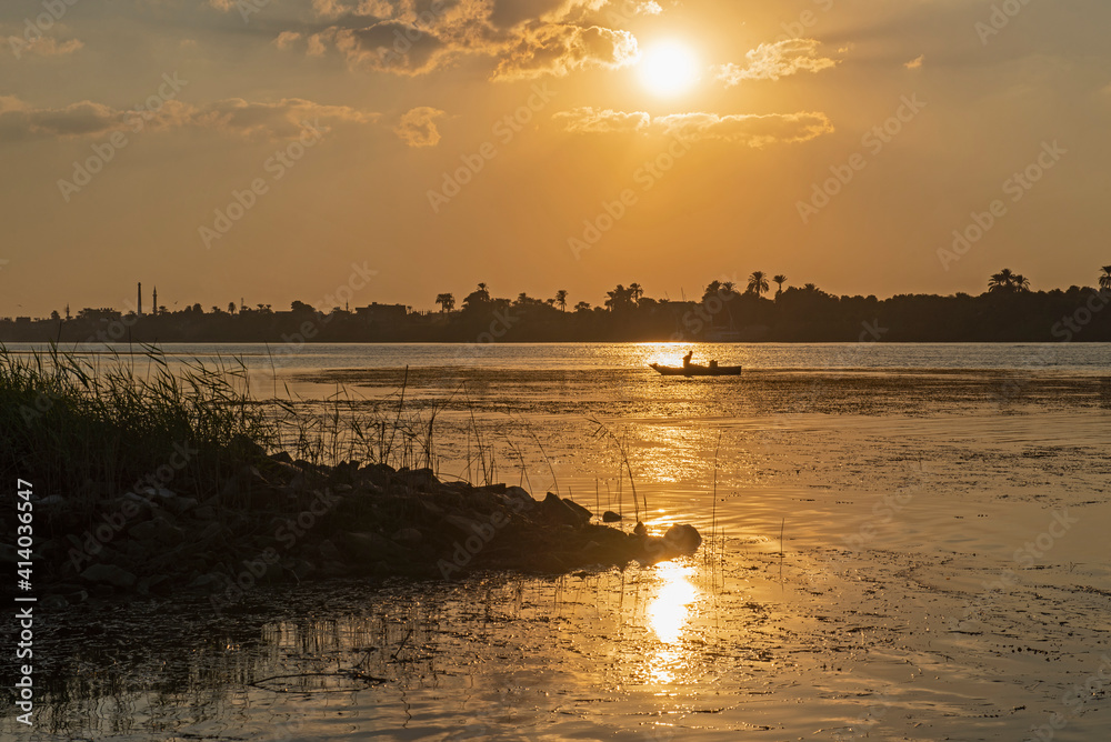 River bank silhouette at dusk sunset River bank silhouette at dusk sunset