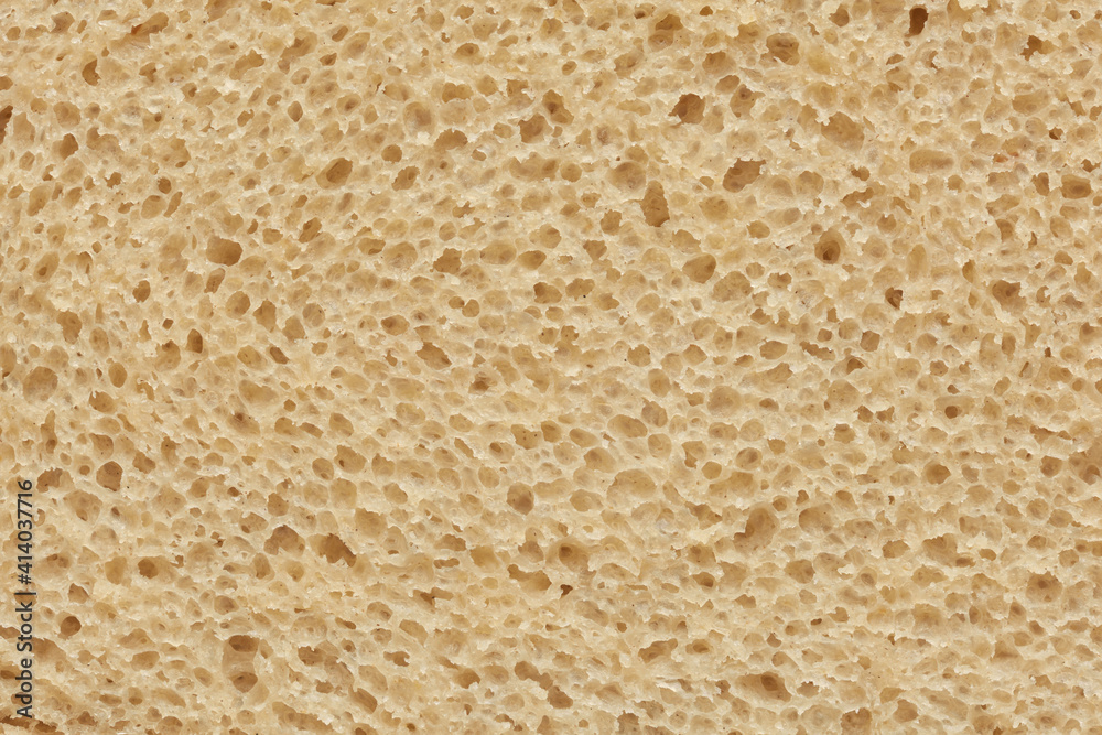 Inside part of sliced rye bread background or texture.