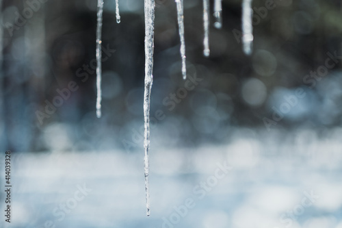 Closeup of icicles with blurry background