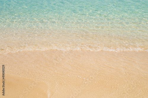 sea with a gentle wave and a sandy beach. Travel, vacation concept.