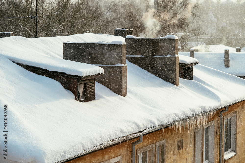 Smoking chimneys during cold and sunny winter day Smoking chimneys during cold and sunny winter day