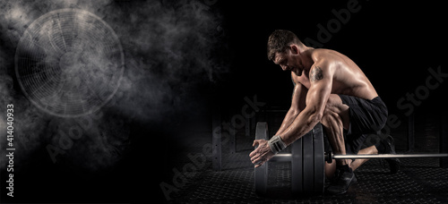 Muscular Man workout with barbell at gym Sports banner