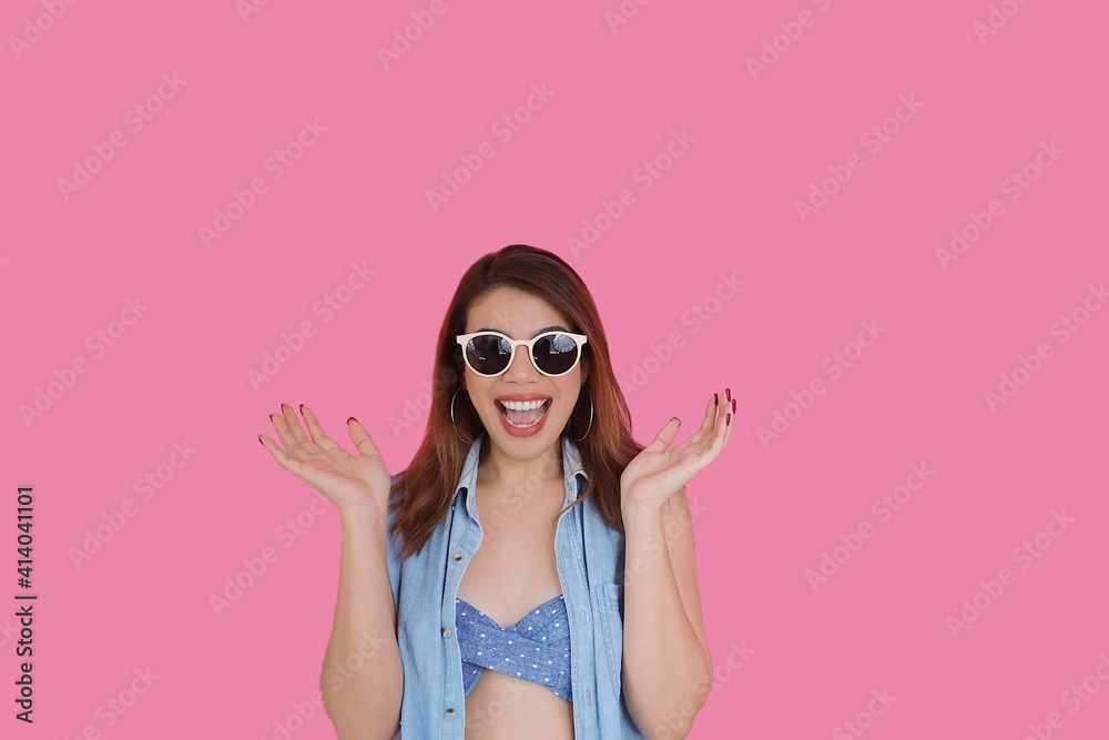 Surprised young woman over pink background. Surprised young woman over pink background.