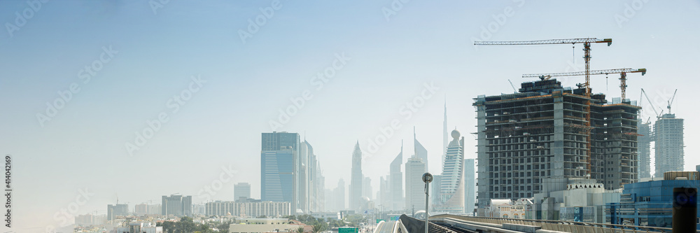 Panorama view of modern skyscrapers and the construction of new skyscrapers. Banner. Panorama view of modern skyscrapers and the construction of new skyscrapers. Banner.