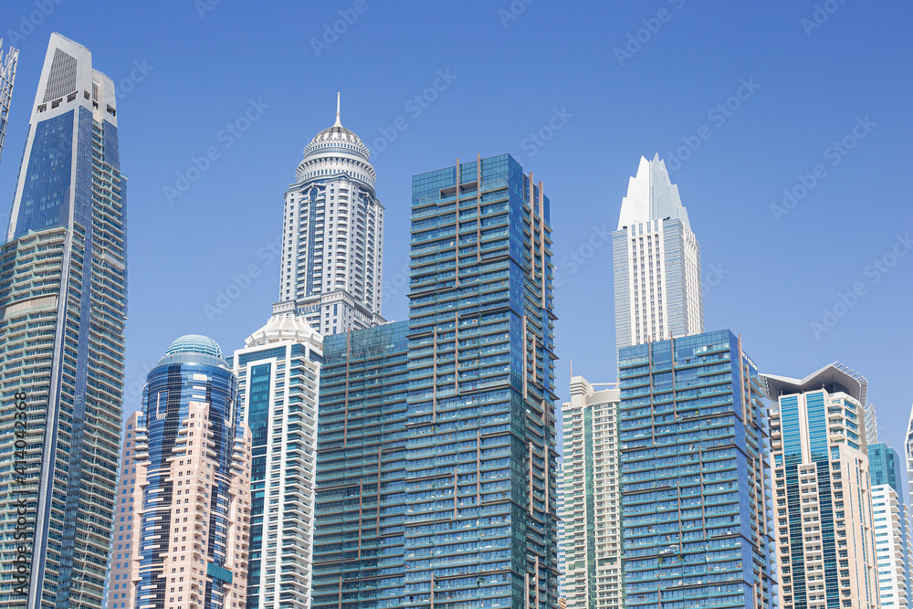 Modern skyscrapers in the financial district of Dubai Marina. Dubai, United Arab Emirates.