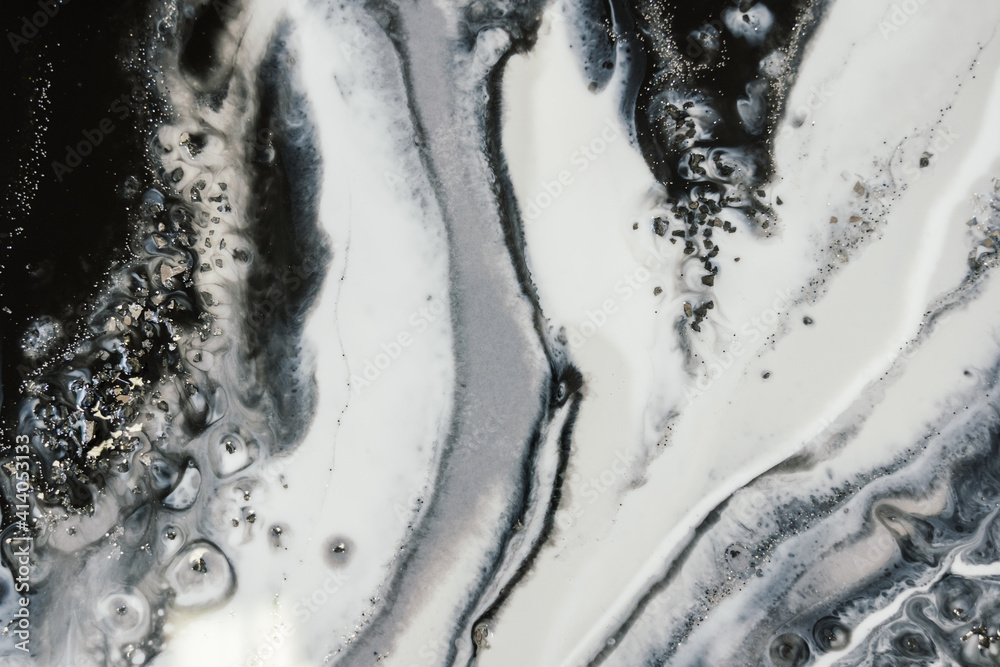 modern abstract design made with epoxy resin. mixing black and white paint  with silver glitter. liquid marble effect Stock Photo | Adobe Stock