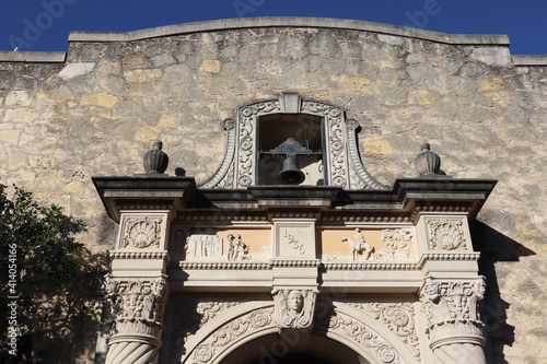 Texture of a rock wall and ornate stonework at the entrance of The Alamo in San Antonio, Texas