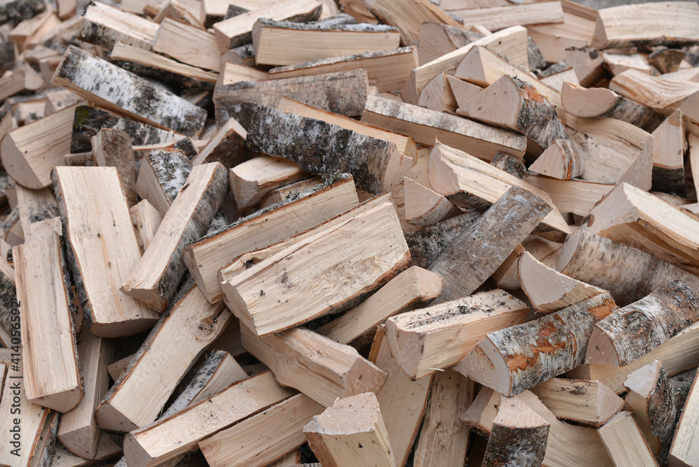 A Stack of birch firewood close up. lot A Stack of birch firewood close up. lot