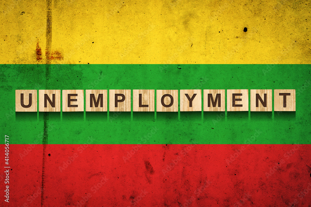 Obraz premium Unemployment. The inscription on wooden blocks on the background of the Lithuania flag. Unemployment growth. Business.