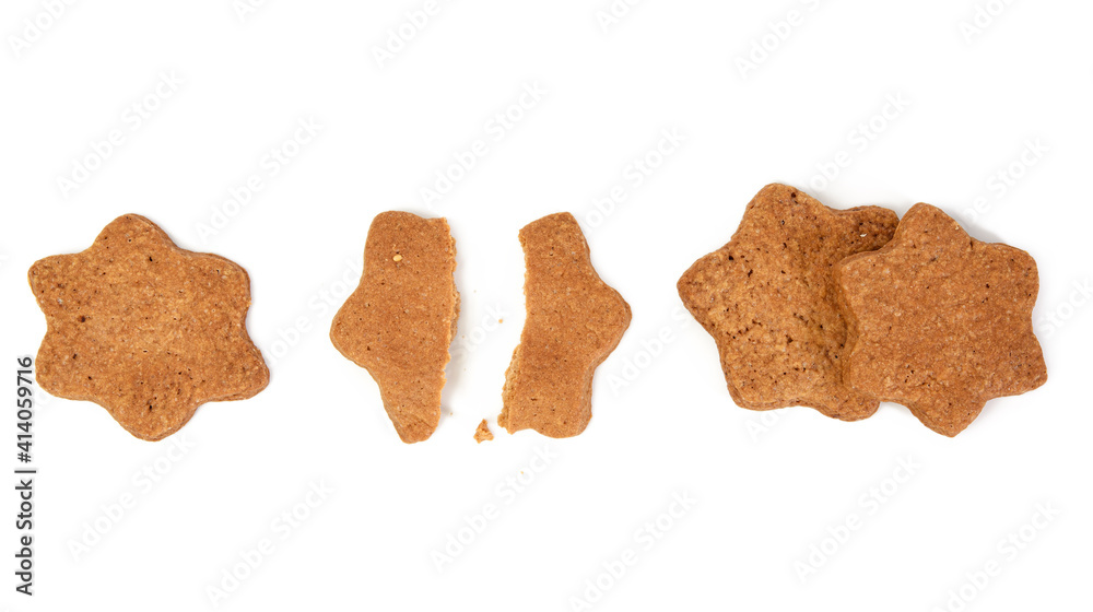 Star shaped baked chocolate gingerbread cookie isolated on white background Star shaped baked chocolate gingerbread cookie isolated on white background
