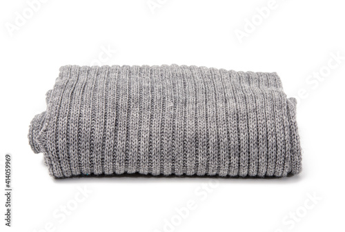 folded gray knitted scarf isolated on white background