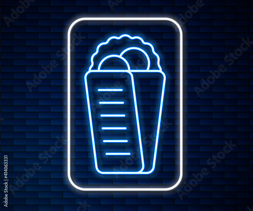 Glowing neon line Gyros Pita Greek fast food traditional cuisine icon isolated on brick wall background. Gyro with greek salad in tzatziki sauce wrapped sandwich. Vector.