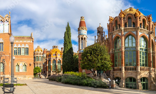 Inside Sant Pau Hospital complex in Barcelona, modernism architecture. Touristic landmark for modern and unique buildings in Catalonia. Modernist facade by Domenech i Muntaner architect. photo