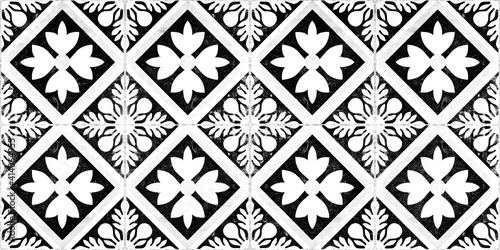 Seamless grunge worn vintage old black white concrete stone cement tiles with leaves flowers rhombus diamond square mosaic texture background