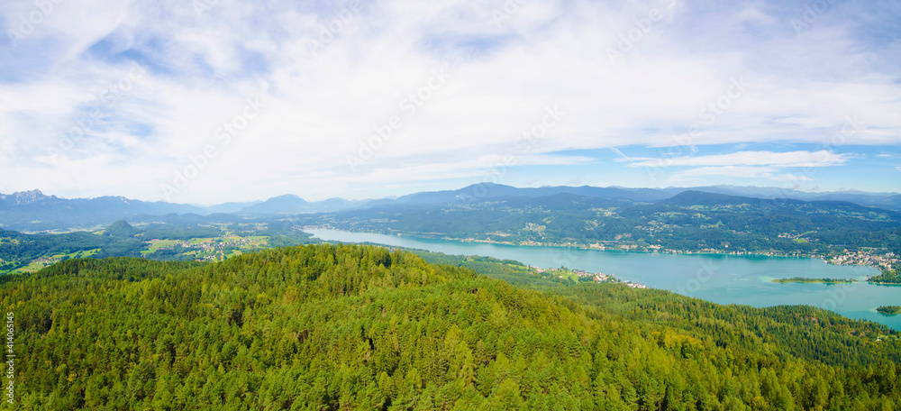 Aerial view of the alpine lake Worthersee, famous tourist attraction for many water activity in Klagenfurt, Carinthia, Austria.