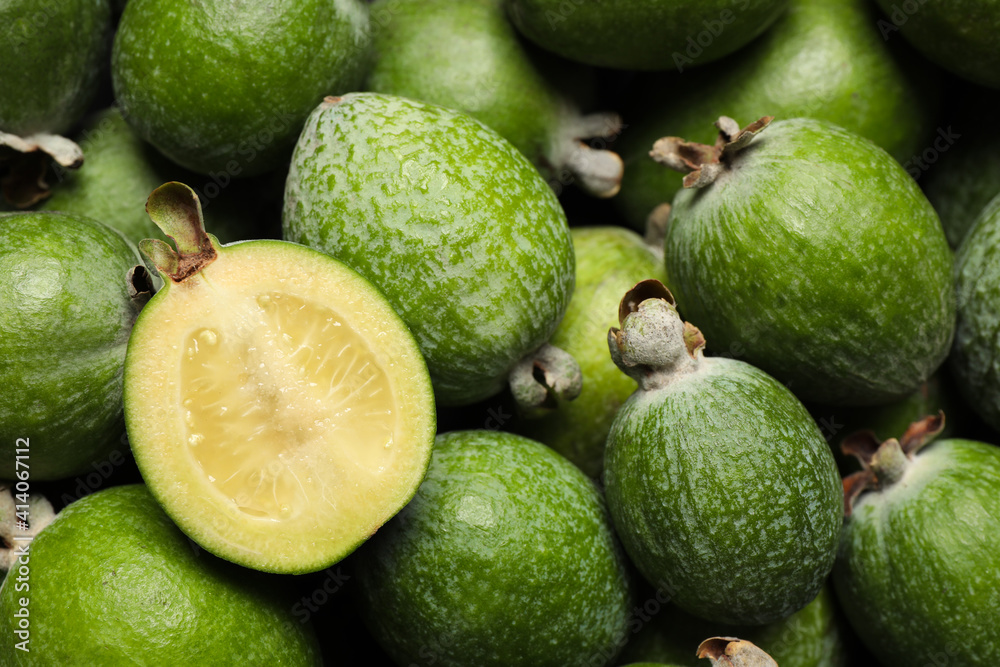 Fresh green feijoa fruits as background, closeup Fresh green feijoa fruits as background, closeup
