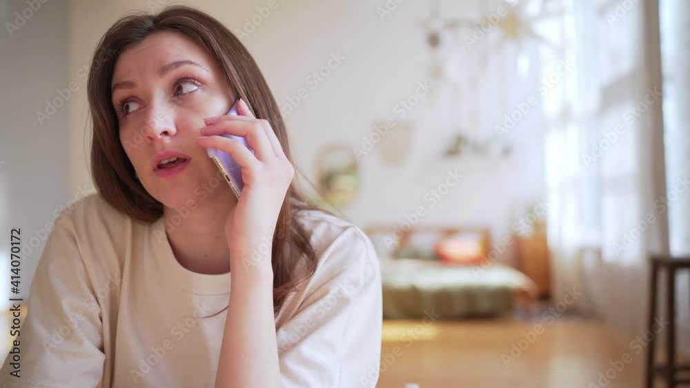 A worried woman talks about work. Overloading information. Chronic fatigue and stress A worried woman talks about work. Overloading information. Chronic fatigue and stress