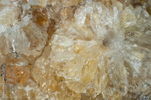 Macro shot of a sample of natural stone - untreated citrine (yellow quartz).
