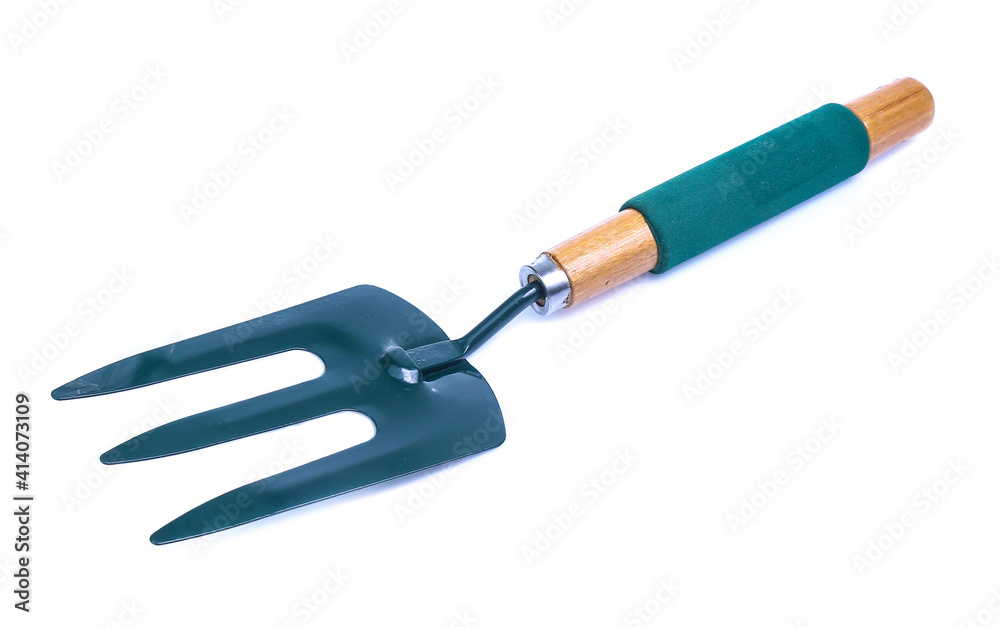 Garden tools shovel and fork isolated on white background Garden tools shovel and fork isolated on white background